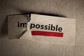 La scritta Impossible alla quale viene tolta la IM iniziale per farla diventare Possible
